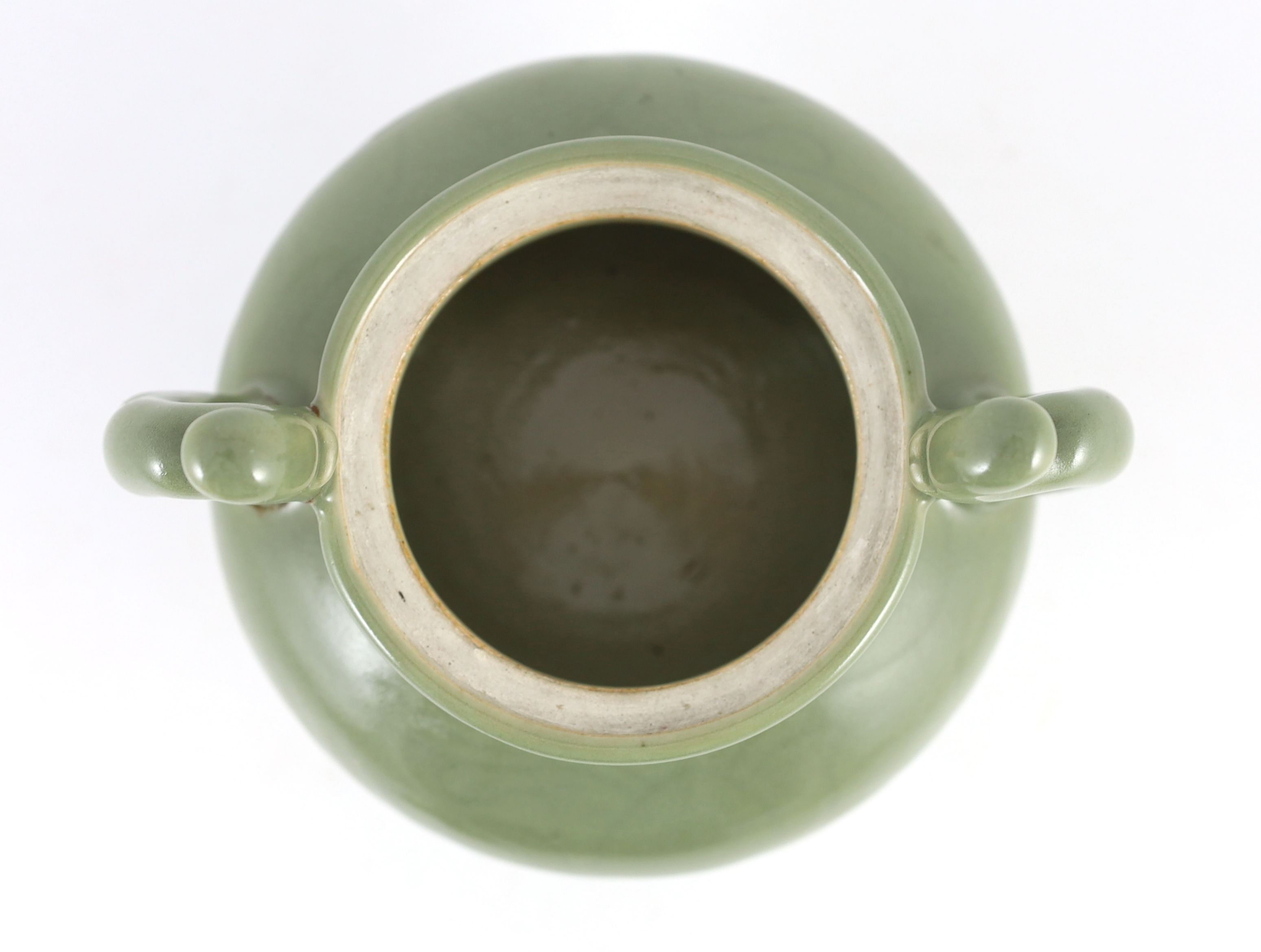 A Chinese celadon glazed tripod censer, late Qing, 26cm